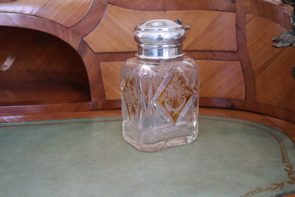 A George V silver lidded amber flash cut glass scent jar, makers mark rubbed, London, 1931, 16.5cm.